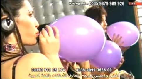 Girl blows up pops balloon